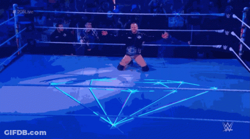 Man In Wrestling Ring With W Logo GIF