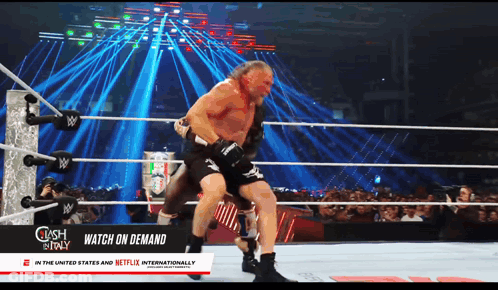 Man In Wrestling Ring With Watch On Demand Sign GIF
