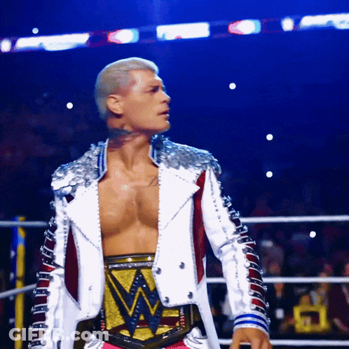 Man In Wrestling Ring With WWE Belt GIF