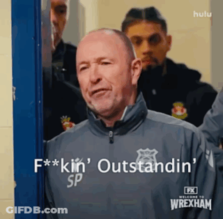 Man In Wrexham Jacket Saying Outstanding GIF