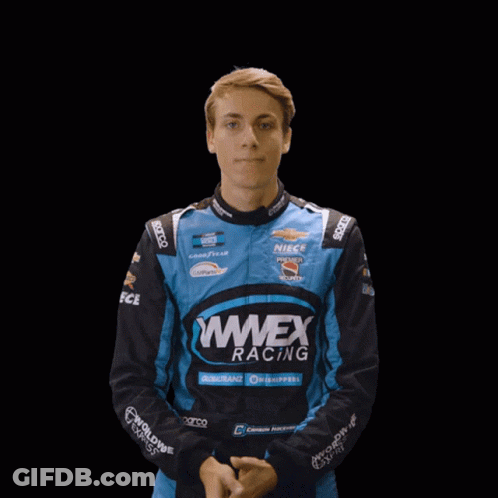 Man In Wweex Racing Jacket With Eyes Closed GIF