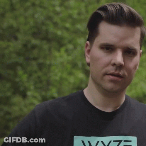 Man In Wyze T-Shirt Making Gesture GIF