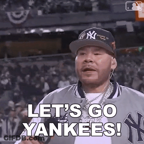 Man In Yankees Hat And Jacket Says Let's Go Yankees GIF