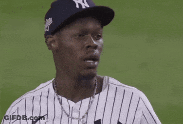 Man In Yankees Hat Scratching Head GIF