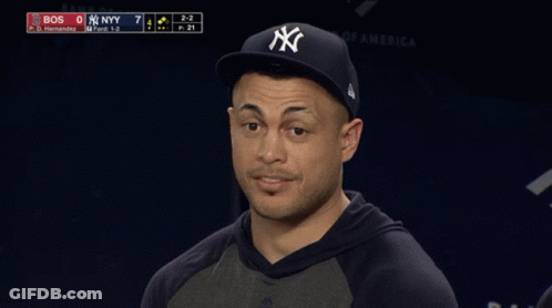 Man In Yankees Hat Smiling At Baseball Game GIF