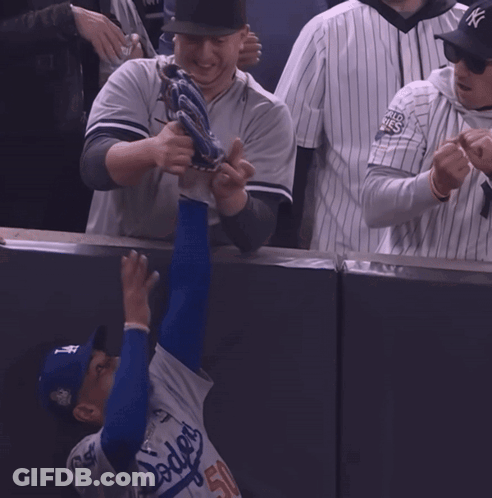 Man In Yankees Jersey Reaching For Ball GIF