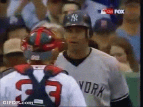 Man In Yankees Jersey Talking To Another Man GIF