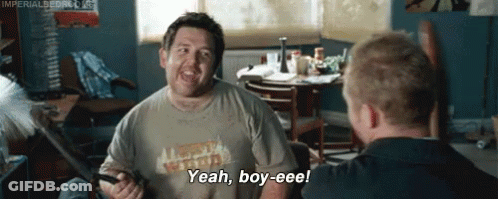 Man In Yeah Boy-Eee Shirt Holding Sword GIF