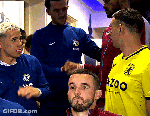 Man In Yellow 420O Shirt Talking To Another GIF