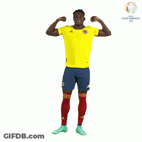 Man In Yellow Adidas Flexing At Copa America Logo GIF
