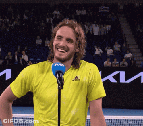 Man In Yellow Adidas Shirt Laughing At Microphone GIF
