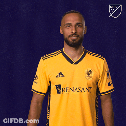 Man In Yellow Adidas Shirt Saluting GIF
