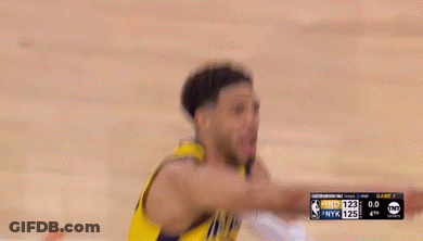 Man In Yellow And Black Basketball Uniform Holding Neck GIF