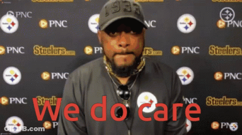 Man In Yellow And Black Jacket Clapping With Headset GIF