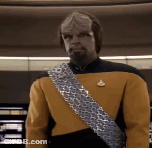 Man In Yellow And Black Uniform GIF