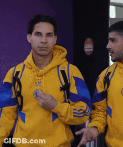 Man In Yellow And Blue Adidas Sweatshirt GIF