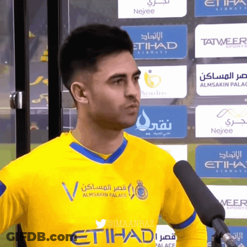 Man In Yellow And Blue Etihad Jersey GIF