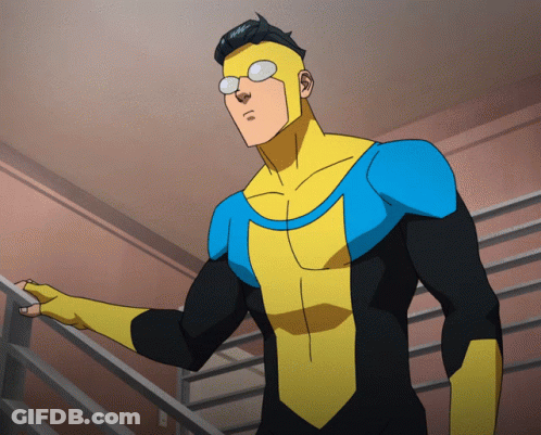 Man In Yellow And Blue Superhero Costume On Stairs GIF