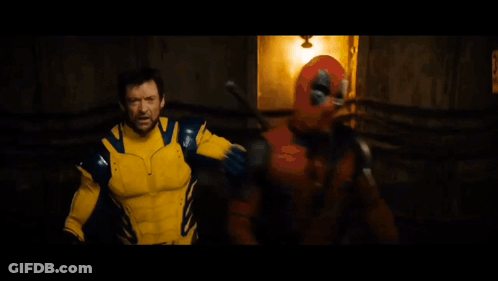 Man In Yellow And Blue Superhero Costume Says Foye Papi GIF