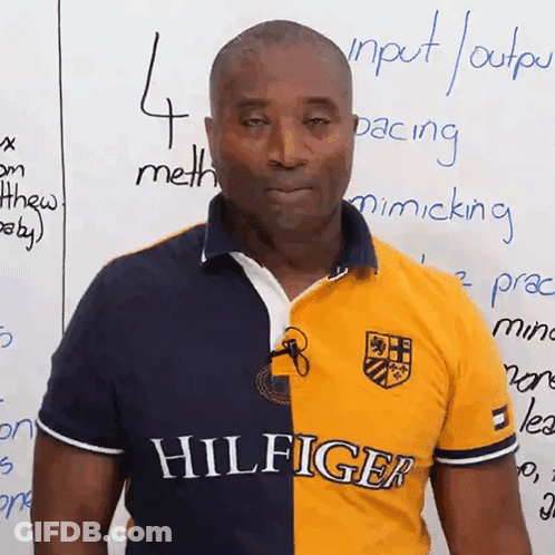 Man In Yellow And Blue Tommy Hilfiger Shirt GIF