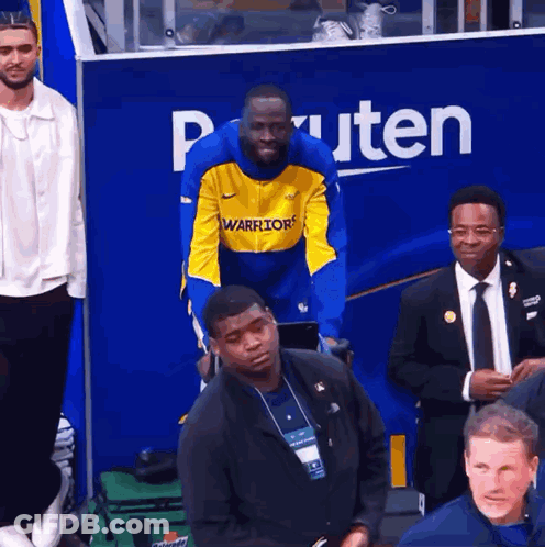 Man In Yellow And Blue Warriors Jacket GIF