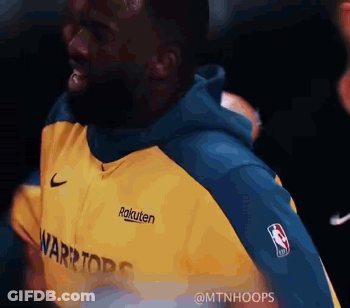 Man In Yellow And Blue Warriors Sweatshirt GIF