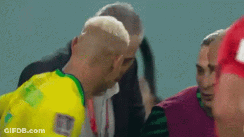 Man In Yellow And Green Jersey Talking GIF