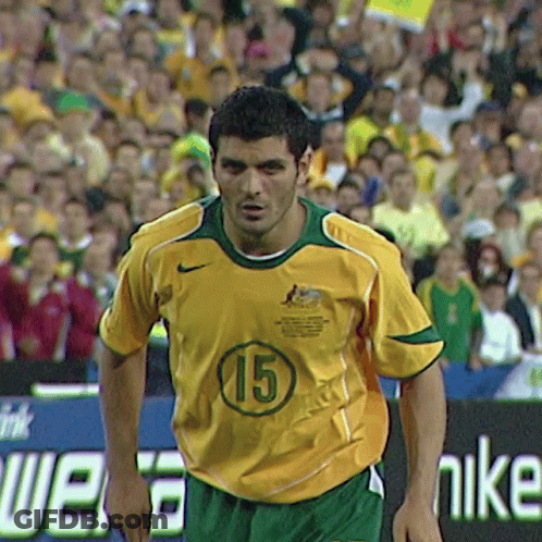 Man In Yellow And Green Nike Jersey Number 15 GIF
