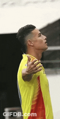 Man In Yellow And Red Shirt Looking Up GIF