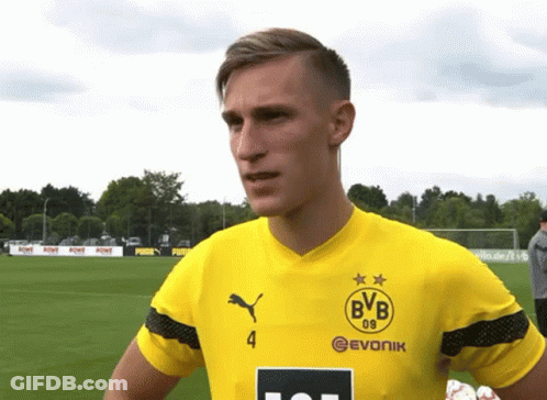 Man In Yellow BVB Jersey On Soccer Field GIF