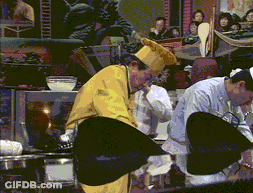 Man In Yellow Chef Hat Before Crowd GIF