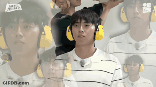 Man In Yellow Ear Muffs With Letter A GIF