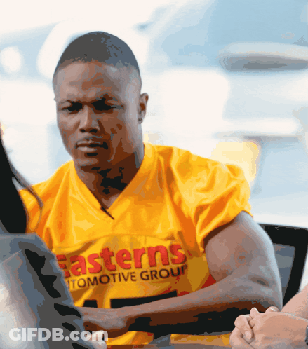 Man In Yellow Easterns Automotive Group Jersey GIF