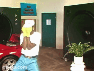 Man In Yellow Gloves In Front Of No Glass Tapping Sign GIF
