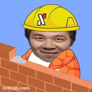 Man In Yellow Hard Hat With Letter X Over Brick Wall GIF