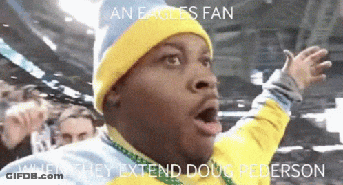 Man In Yellow Hat And Blue Beanie Eagles Fan Doug Peterson GIF