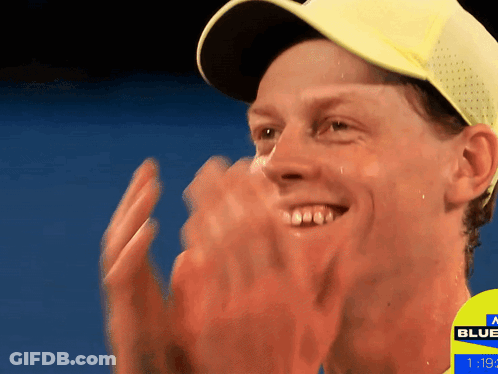 Man In Yellow Hat Applauds Sign Saying Blue GIF