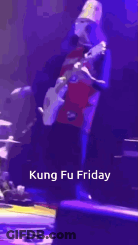 Man In Yellow Hat Playing Guitar Kung Fu Friday GIF