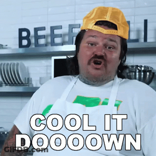 Man In Yellow Hat Saying Cool It Dooooown GIF