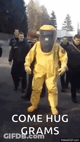 Man In Yellow Hazmat Suit GIF