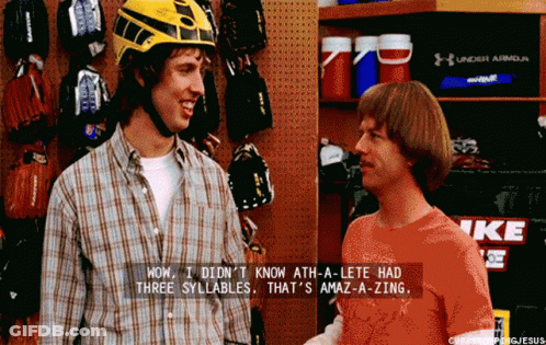 Man In Yellow Helmet Talking To Another Man GIF