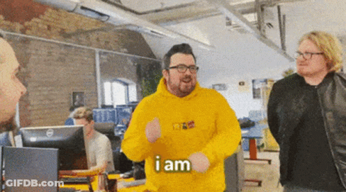 Man In Yellow Hoodie Dancing GIF