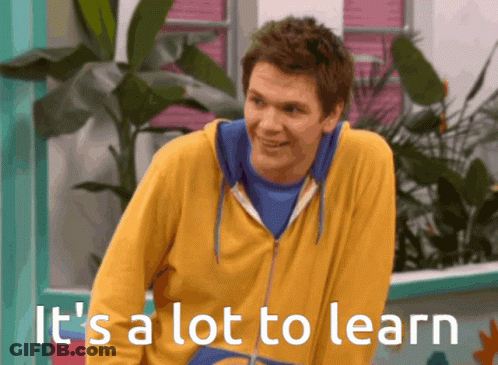 Man In Yellow Hoodie Smiling It's A Lot To Learn GIF