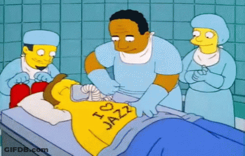 Man In Yellow I Love Jazz Shirt Operated On GIF