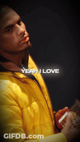 Man In Yellow Jacket Holding Cigarette Saying Yeah I Love GIF
