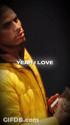 Man In Yellow Jacket Holding Cigarette Saying Yeah I Love GIF