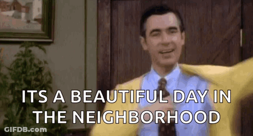 Man In Yellow Jacket Saying Beautiful Day GIF