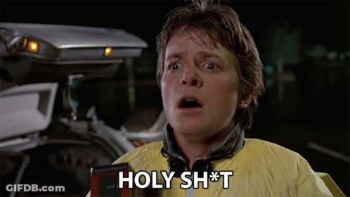 Man In Yellow Jacket Saying Holy Shit GIF