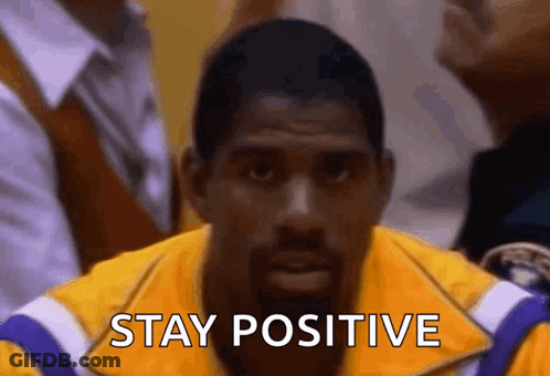 Man In Yellow Jacket Says Stay Positive GIF