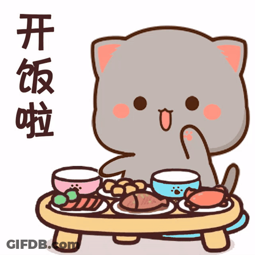 Man In Yellow Jacket Sitting With Tongue Out GIF